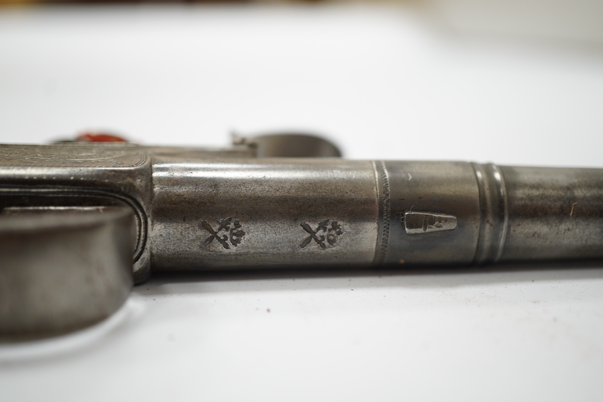 A cannon barrel flintlock boxlock travelling pistol by R. Daykin of Nottingham, with turn off cannon barrel, Tower private proof marks, signed frame upon foliate engraved background, slab walnut grip and sliding trigger